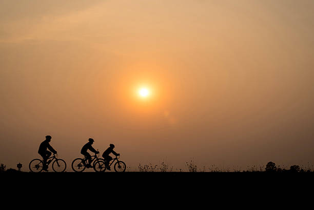 istock Movement of cyclist on beautiful sunset 511718678