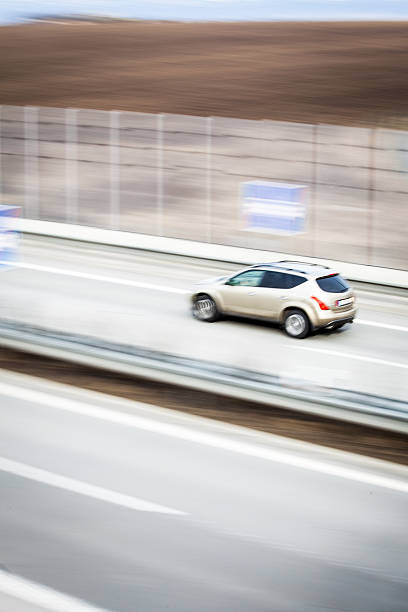 istock Cars moving fast on a highway 511719746