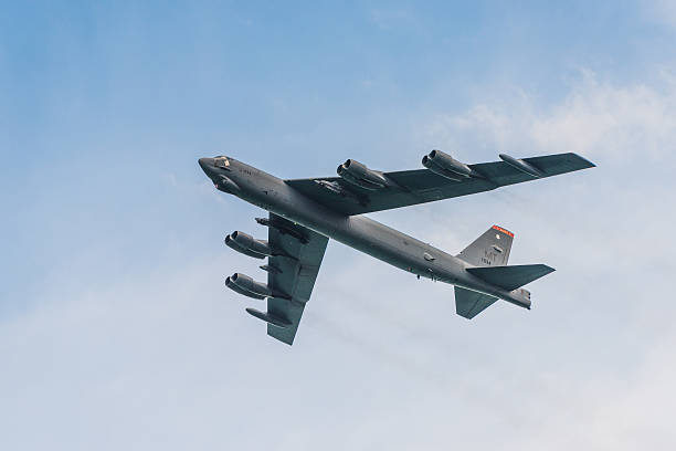 Singapore, Singapore - February 21, 2016: The Boeing B-52 Stratofortress during the Aerobatic Flying Displays at Singapore Airshow at Changi Exhibition Centre in Singapore.