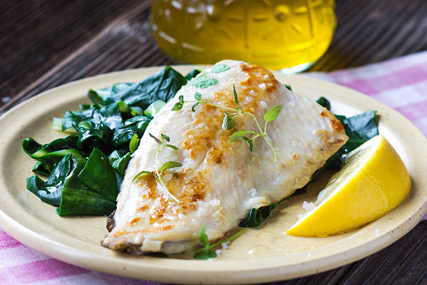 istock Fish dish -  fish fillet with chard 511727716