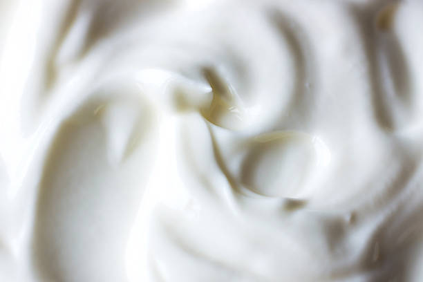 istock Creamy natural yogurt background. Closeup view. 511727930