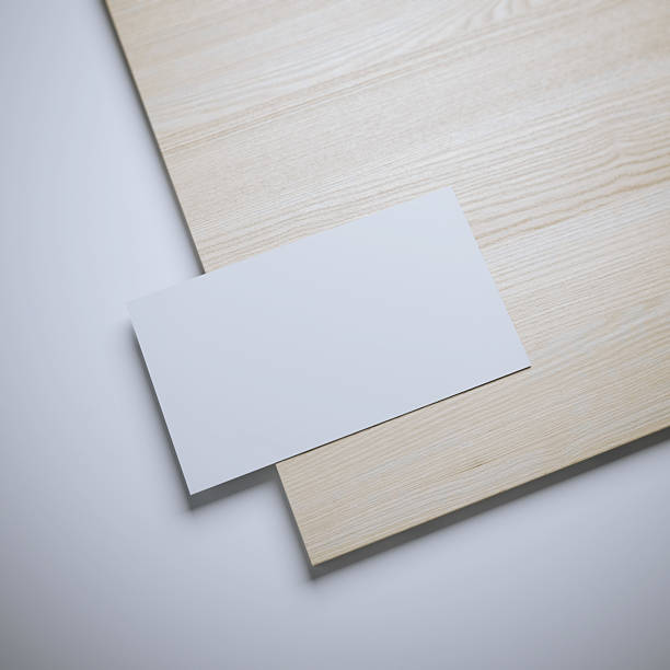 istock White blank business card and wooden board 511729274
