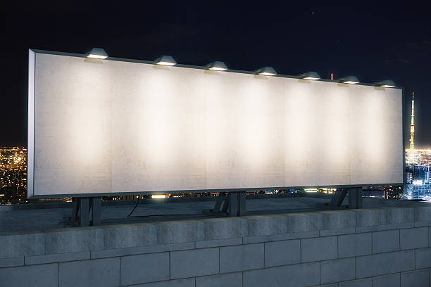 istock Blank white billboard on the top of building 511734978