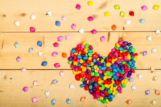 istock heart shape colorful on wooden background 511735550