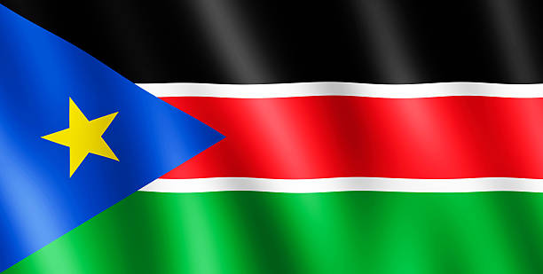 bandiera del sudan del sud che ondeggiano al vento - republic of the sudan foto e immagini stock