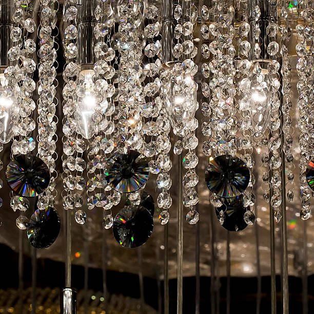 istock Chrystal chandelier close-up. Glamour background with copy space 511737335