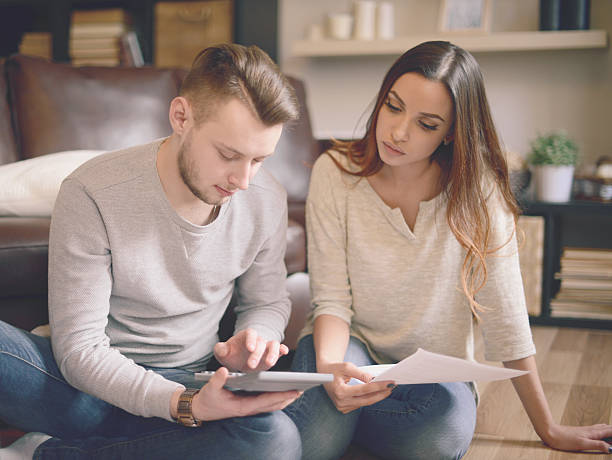 istock Young beautiful couple in home interior 511739456
