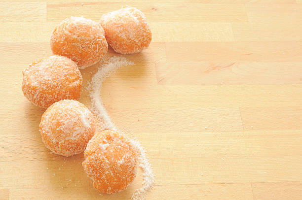 background with sweet fritters and sugar on wood stock photo