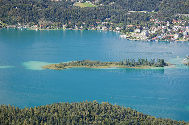 Panoramic View of Lake Worthersee Panoramic View of Lake Worthersee (Carinthia, Austria) pörtschach am wörthersee stock pictures, royalty-free photos & images