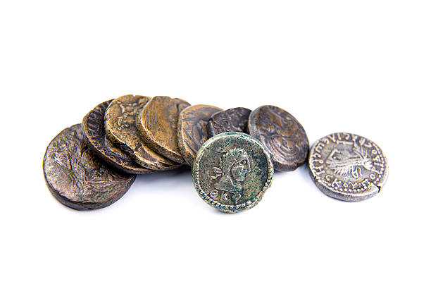 istock Vintage coins with portraits of kings on over white 511740708