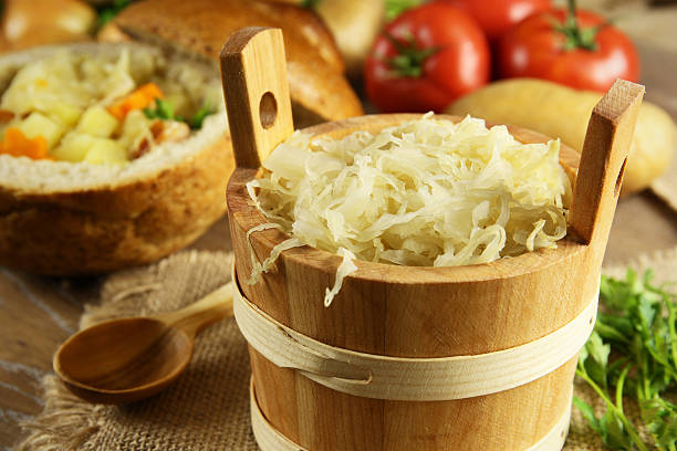 Sauerkraut in a wooden barrel stock photo