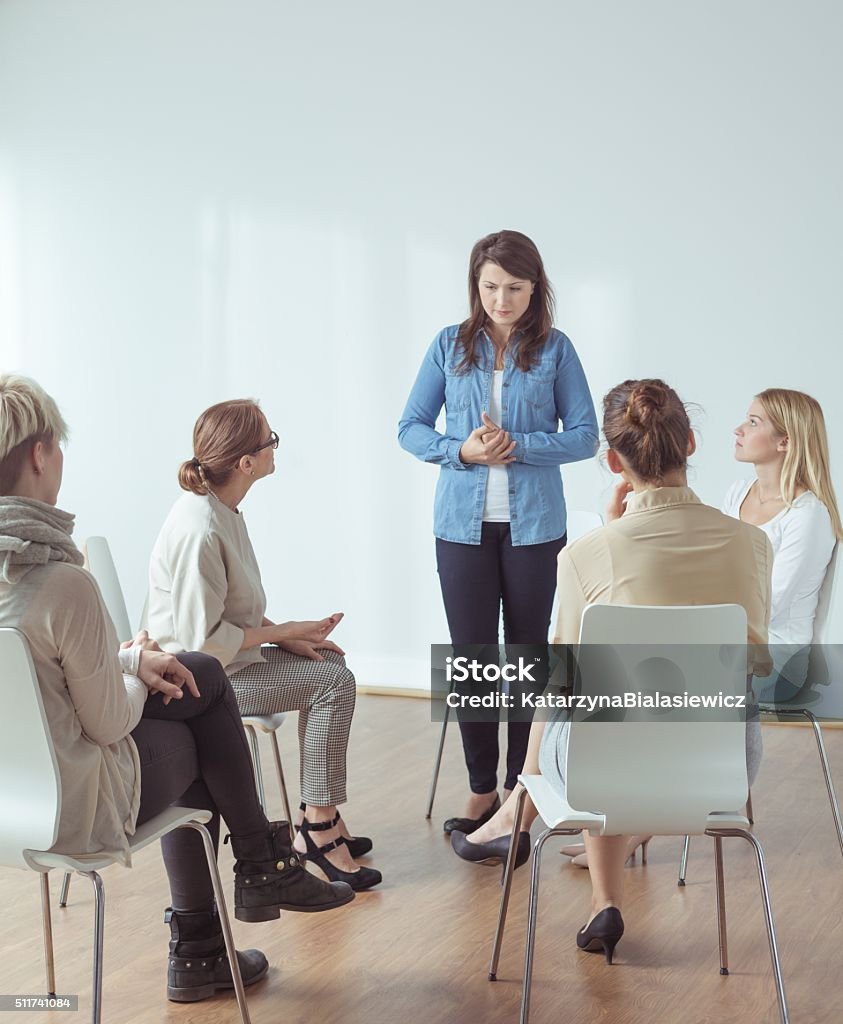 Feeling stressed during public appearance Young woman feeling stressed during public appearance Shy Stock Photo