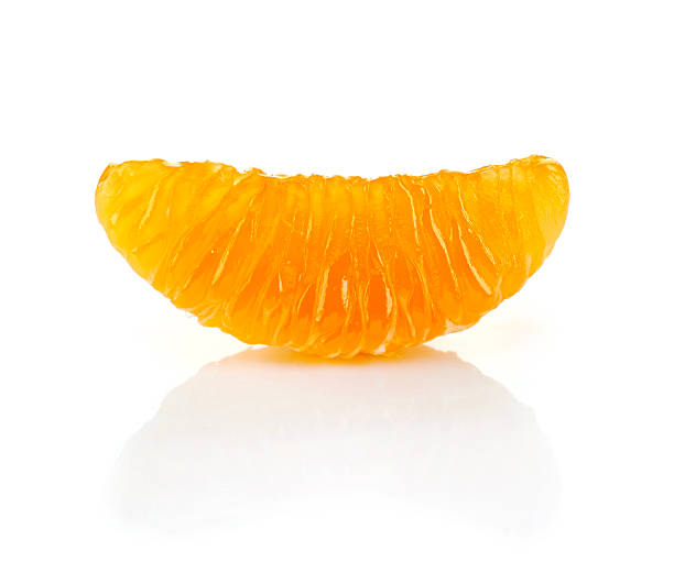 istock Slice of mandarin on white background 511741496