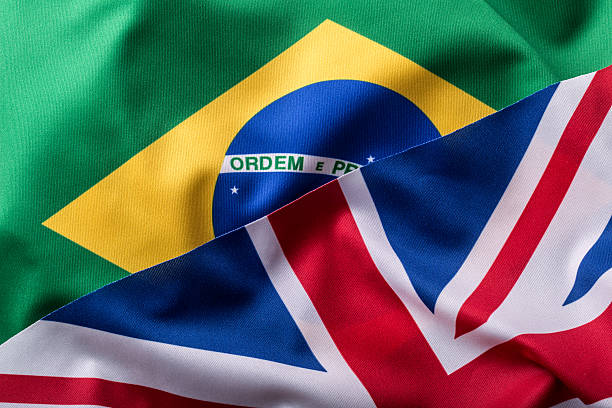 istock Brasil and UK. Brasil flag an UK Flag. 511742228