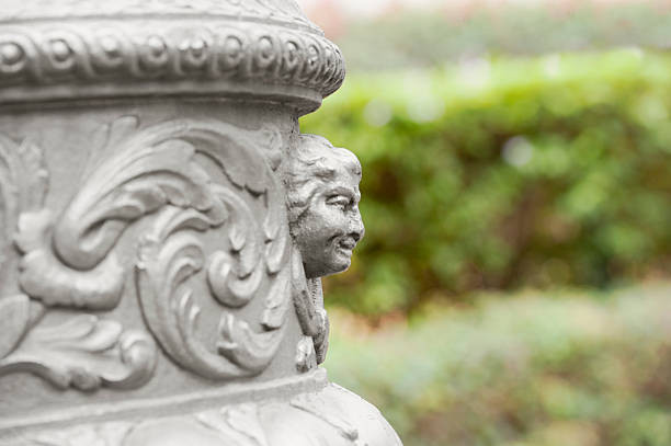 istock Fragment of decorative head column sculpture 511742518