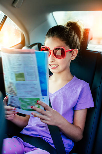 istock Reading kids in the car 511743482
