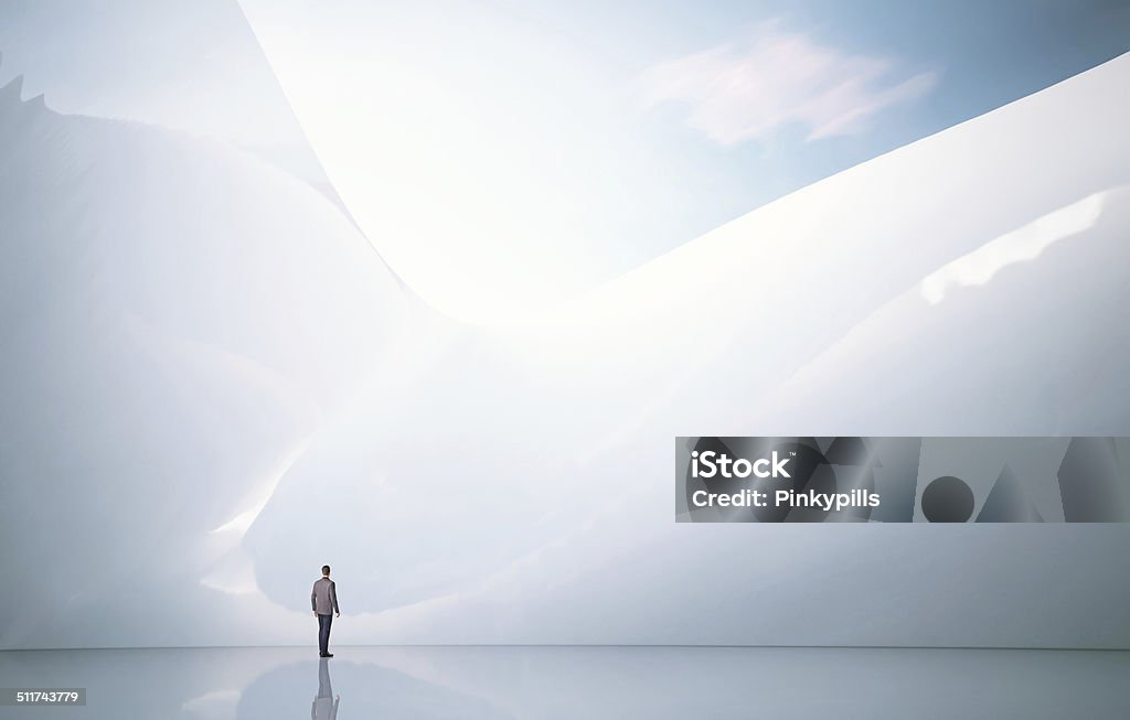 Business man on a abstract architectural background Abstract Stock Photo
