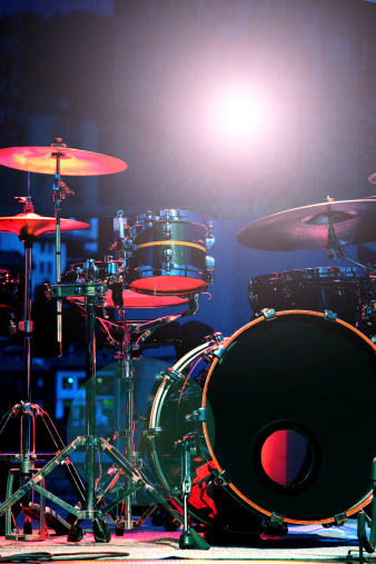 Drum Set with some cymbals on stage before a live Concert.Drum Set with some cymbals on stage before a live Concert.