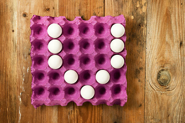 istock Letter V from the eggs in paper tray 511745142