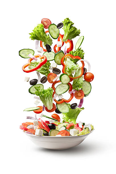 voar salada isolado num fundo branco - salad ingredient imagens e fotografias de stock