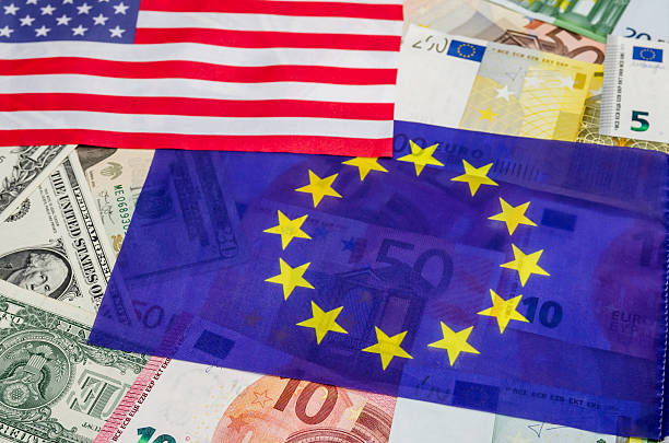 istock flag europe and dollar with banknotes 511745800