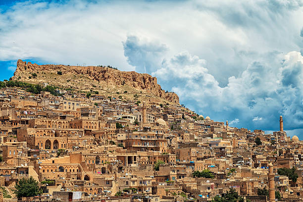 Historical city - Mardin Old City in Middle East with amazing cloudscape in Mardin (Mesopotamia) Turkey halfeti stock pictures, royalty-free photos & images