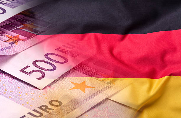 bandiera della germania e il concetto di denaro europeo unione. bandiera - currency exchange currency euro symbol european union currency foto e immagini stock