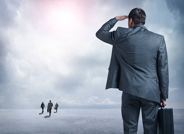 istock Businessman Watching His Competition Get Out In Front Of Him 511748630