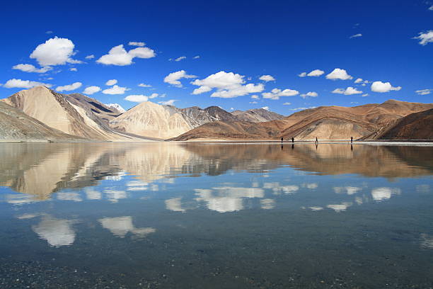 Reflection of Pangong Tso Lake This is reflection of Pangong tso lake in Ladakh , north of India  , with beautiful sky  moonland stock pictures, royalty-free photos & images