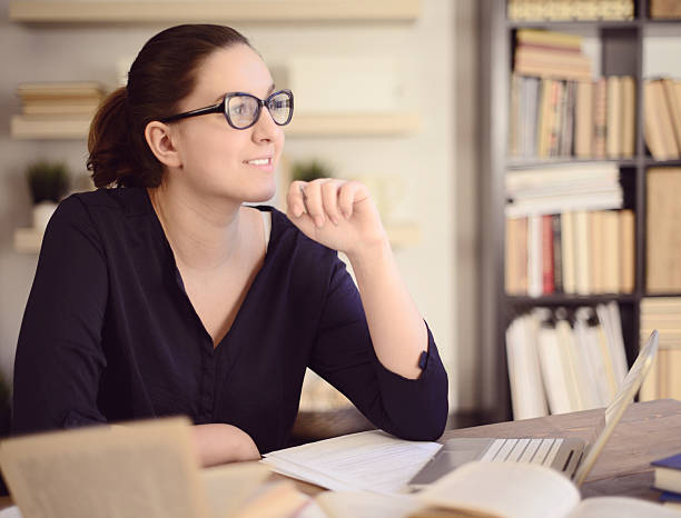 istock beautiful young woman working at home 511749994