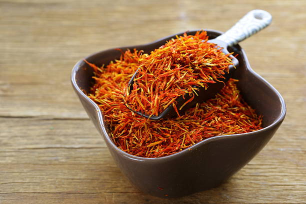 istock Saffron spice on a wooden background macro shot soft focus 511778103