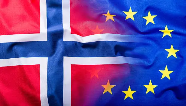 Photo of Flags of the Norway and the European Union.Flag money concept.