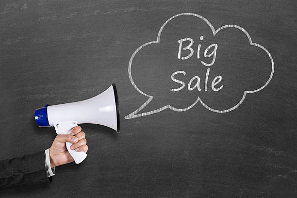 istock Big sale concept with megaphone on blackboard 511785454