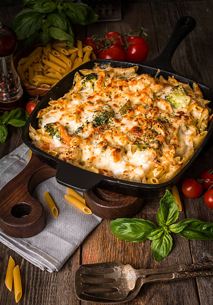 istock Baked pasta with broccoli, cauliflower, cheese and bechamel sauc 511787924