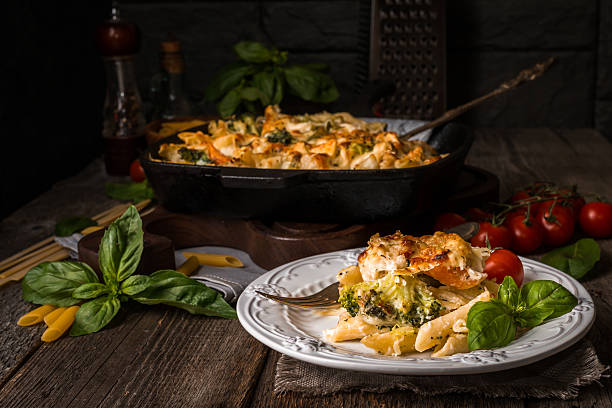 istock Baked pasta with broccoli, cauliflower, cheese and bechamel sauc 511788294