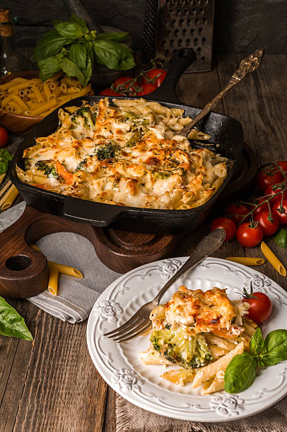 istock Baked pasta with broccoli, cauliflower, cheese and bechamel sauc 511788368
