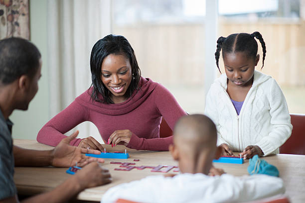 istock Family Game Night Around the Table 511788660