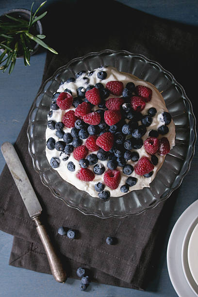 istock Pavlova dessert with fresh berries 511790506