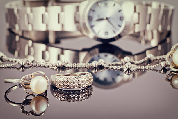 istock Elegant silver ring and silver chain and women's watches 511794134