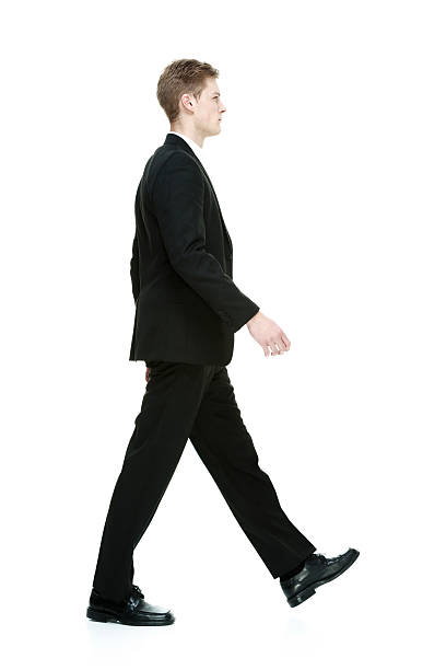istock Side view of businessman walking 511794279
