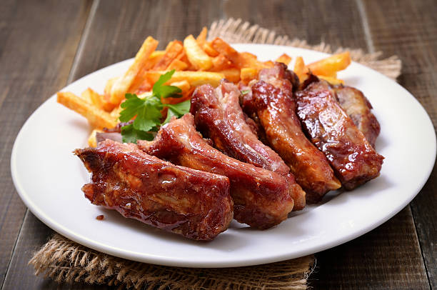 Roasted pork ribs and potato fries
