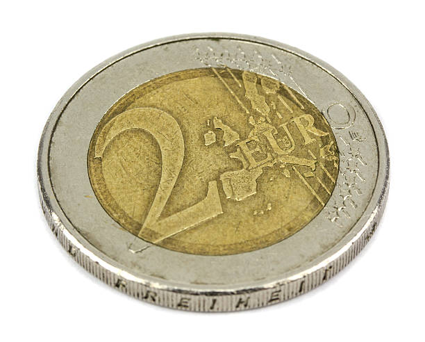 istock two euro coin closeup on white background! 511795496