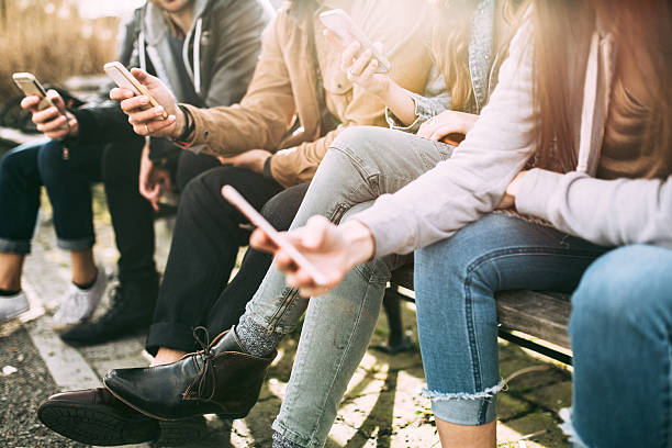 istock Group of Friends on Smart Phones 511795864