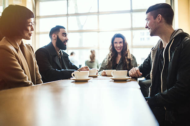 istock Friends Talking in Coffee Shop 511796714