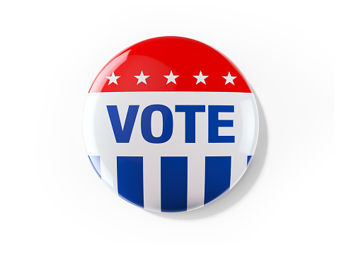 Vote badge with US flag for elections in the United States of America. Isolated on white background. Great use for election and voting concepts. Clipping path is included.