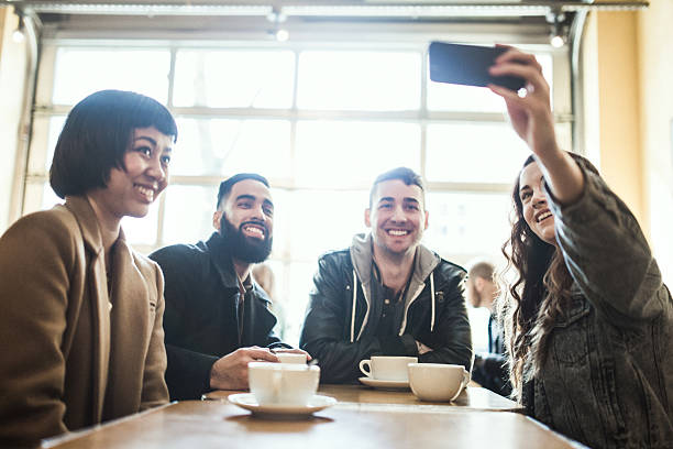 istock Friends Talking in Coffee Shop 511797964