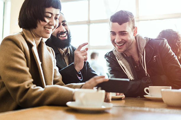 istock Friends Talking in Coffee Shop 511798402
