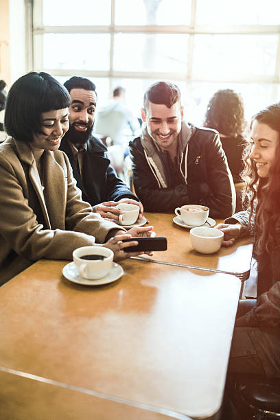 istock Friends Talking in Coffee Shop 511798870