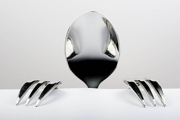 istock Figure of spoon and two forks. 511799210