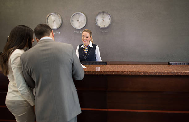istock Business couple doing check in at the hotel 511799732